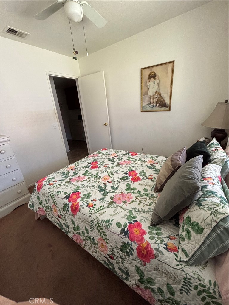 107 East Baseline Road San Dimas, CA 91773 - Photo 21 of 52 a bed room with a bed and a dresser