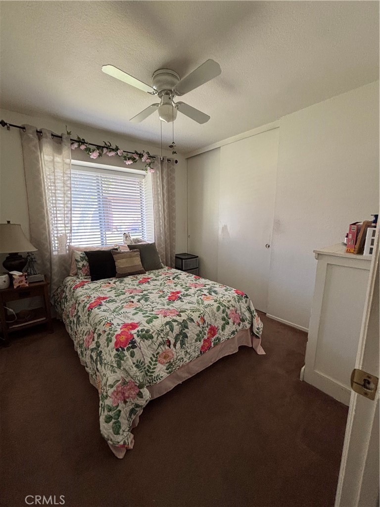 107 East Baseline Road San Dimas, CA 91773 - Photo 22 of 52 a bedroom with a bed and window