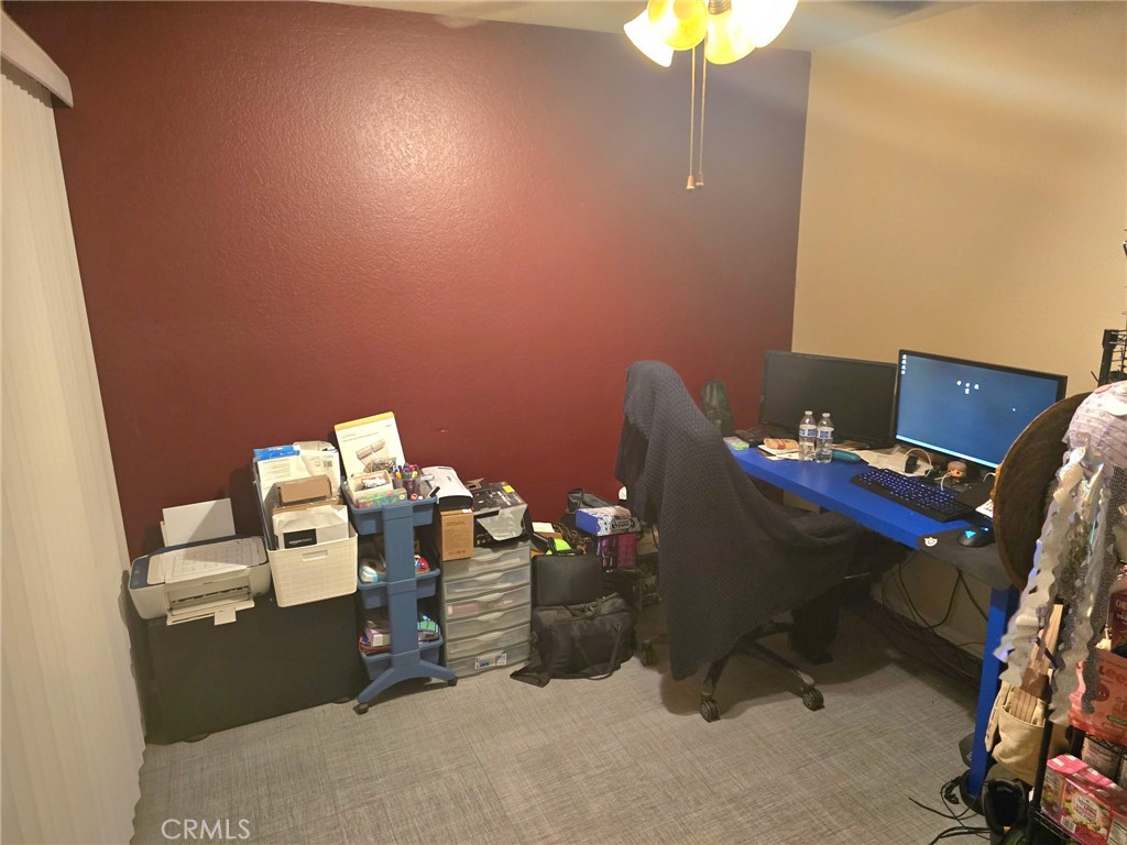 107 East Baseline Road San Dimas, CA 91773 - Photo 34 of 52 a room with a workspace