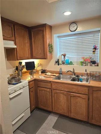 a view of a big room with closet and a ceiling fan