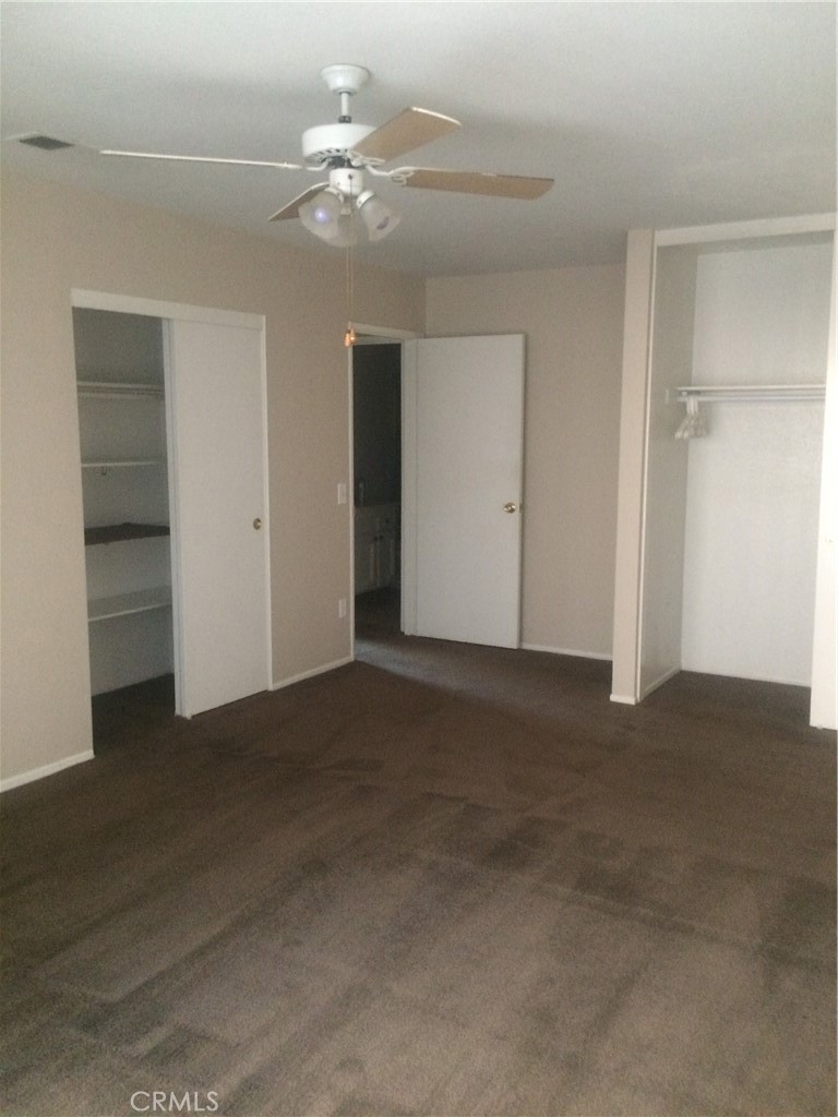 107 East Baseline Road San Dimas, CA 91773 - Photo 37 of 52 a view of a big room with closet and a ceiling fan