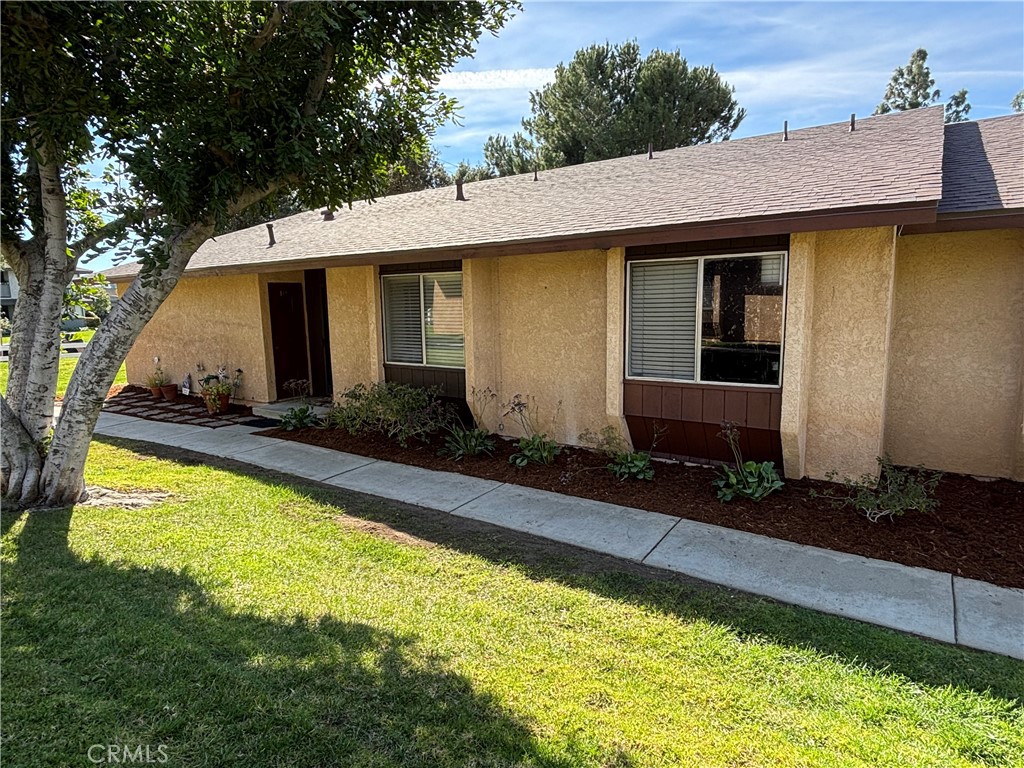 107 East Baseline Road San Dimas, CA 91773 - Photo 4 of 52 a front view of a house with a yard