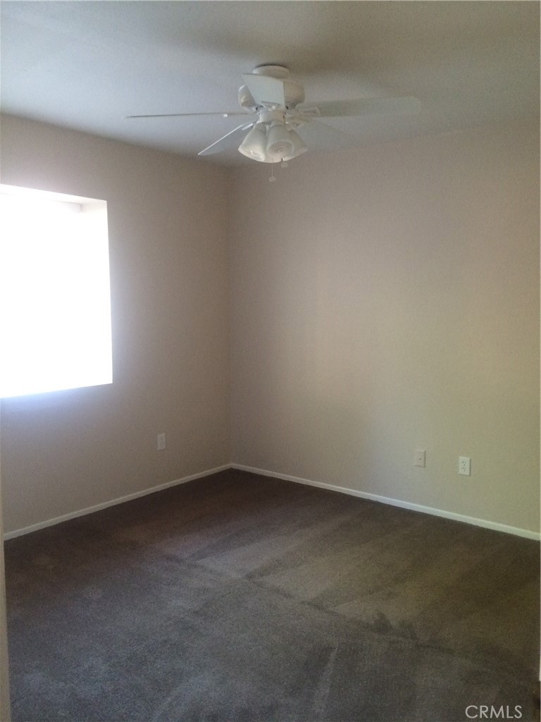 107 East Baseline Road San Dimas, CA 91773 - Photo 45 of 52 an empty room with a window and a fan