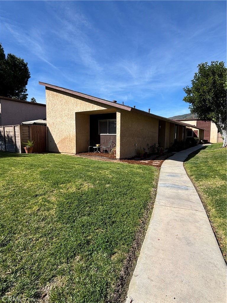 107 East Baseline Road San Dimas, CA 91773 - Photo 50 of 52 a view of a backyard with potted plants