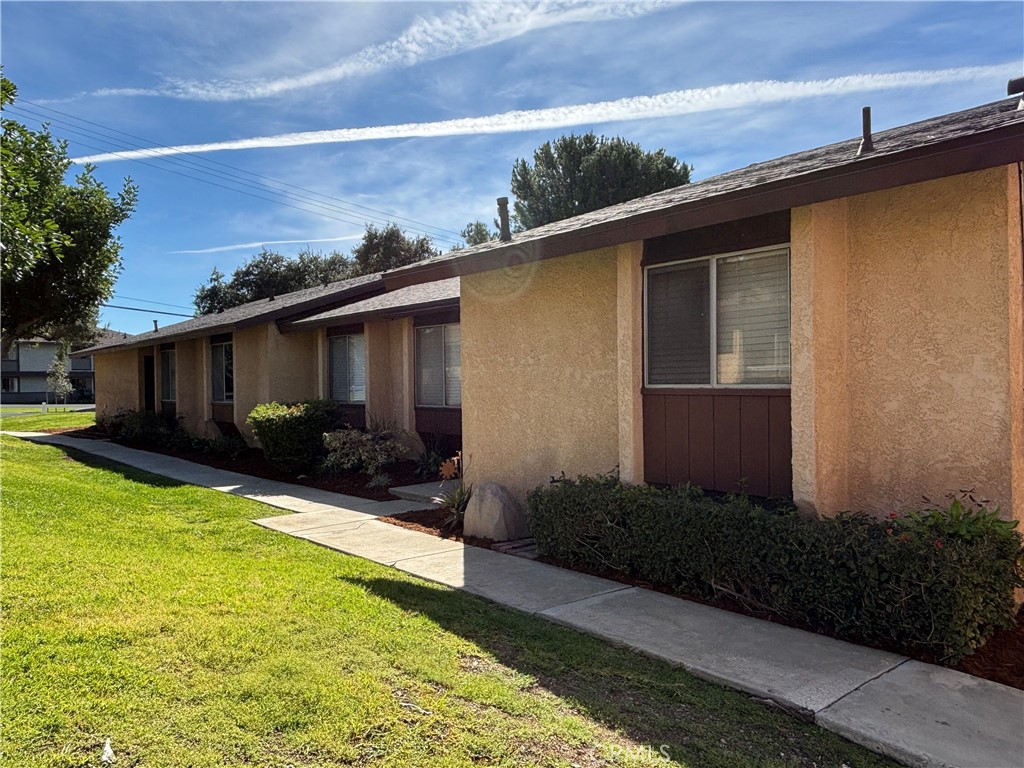 107 East Baseline Road San Dimas, CA 91773 - Photo 5 of 52 a view of house with backyard space and garden