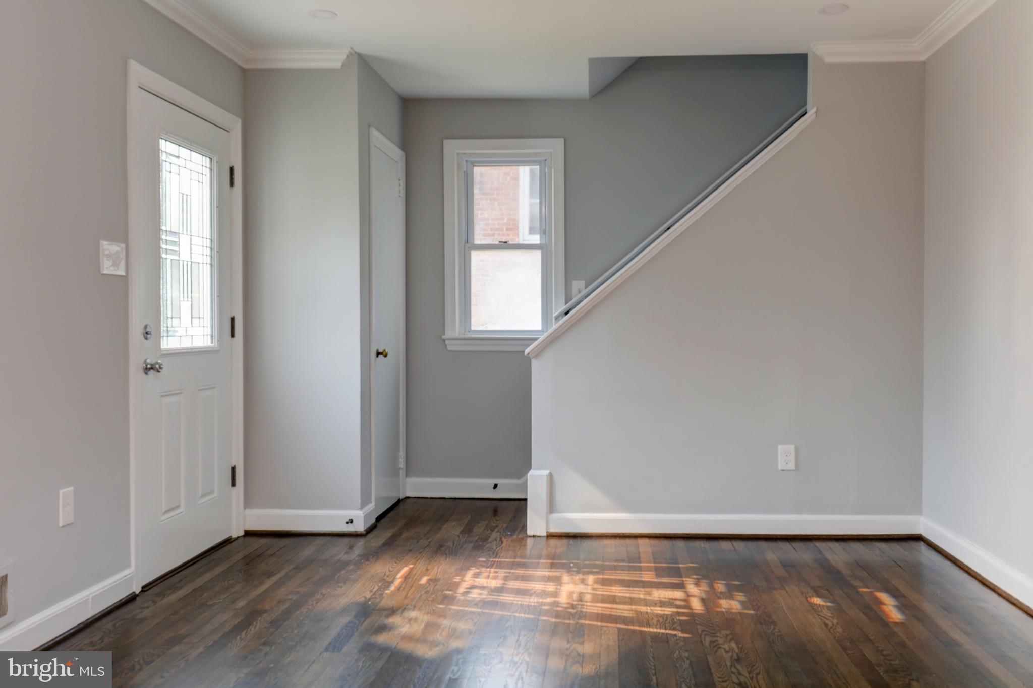 6513 Red Top Road Hyattsville, MD 20783 - Photo 11 of 27 Living room with stair way to upper level