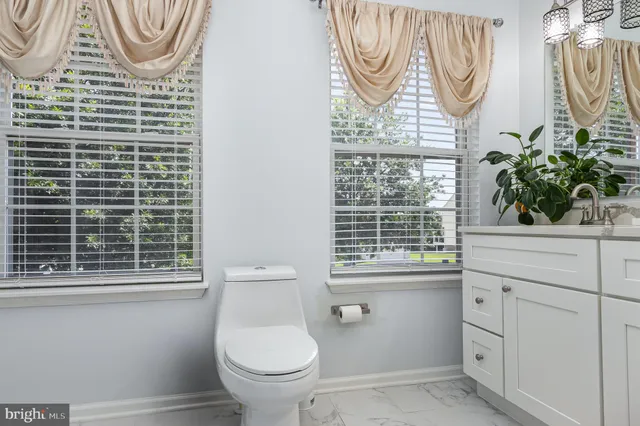 a bed room with a bed and a desk