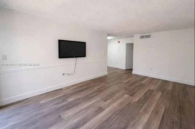 a room with a flat screen tv