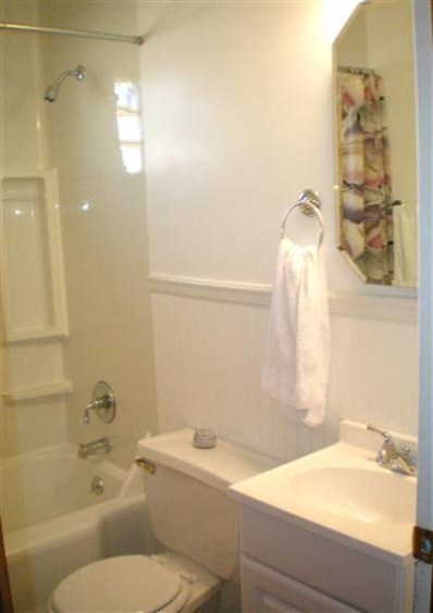 1549 Shell Street Hammond, IN 46320 - Photo 6 of 10 a bathroom with a sink and a mirror