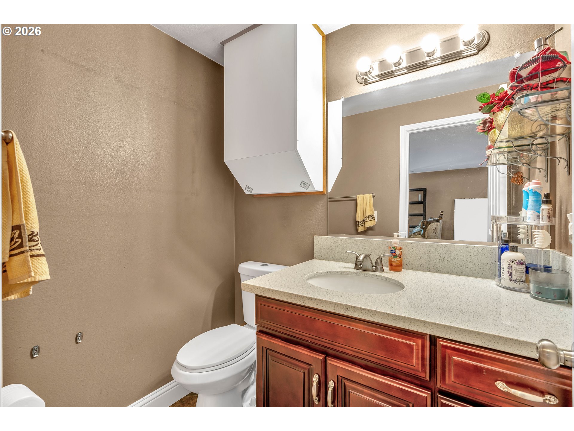 21498 Southwest Jay Street Beaverton, OR 97003 - Photo 21 of 47 a bathroom with a sink and a mirror