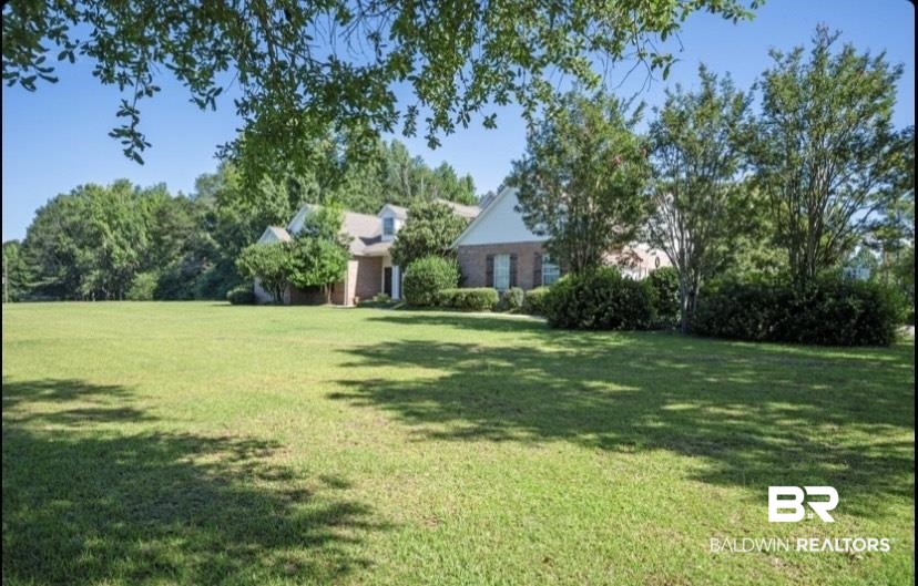 141 Blue Ridge Drive Monroeville, AL 36460 - Photo 29 of 40 View of green lawn