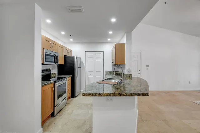 $450,000 | 3207 Clint Moore Road, Unit 206, Boca Raton, FL 33496