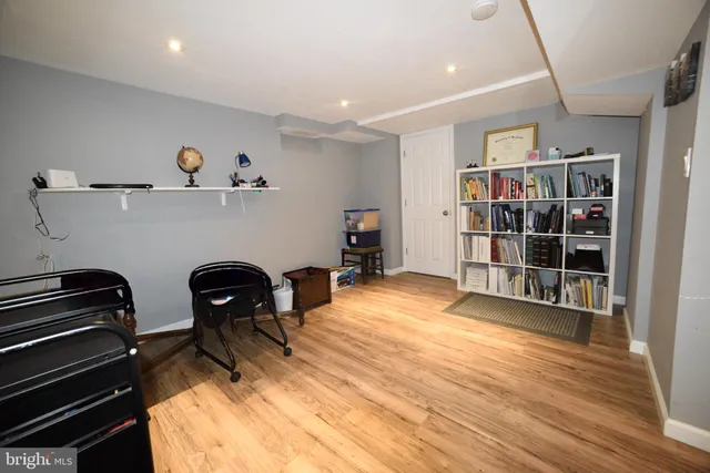 a workspace with wooden floor