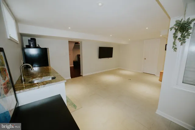 a view of a livingroom with a staircase