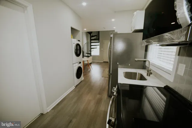 a view of livingroom and dining room with furniture