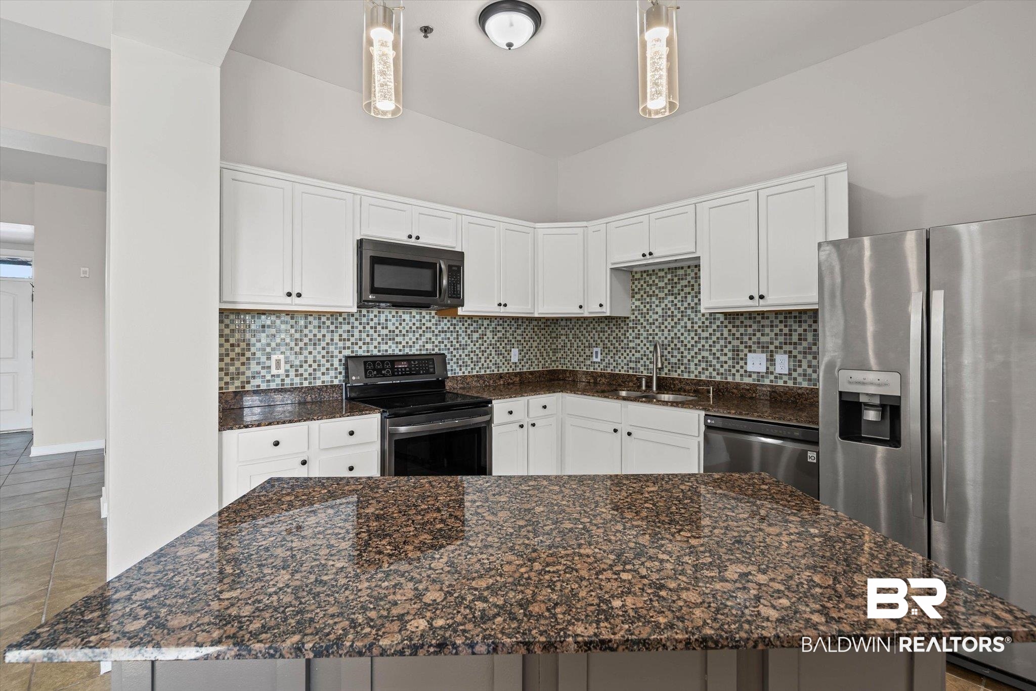 1430 Regency Road, Unit C202 Gulf Shores, AL 36542 - Photo 7 of 27 Custom tiled kitchen