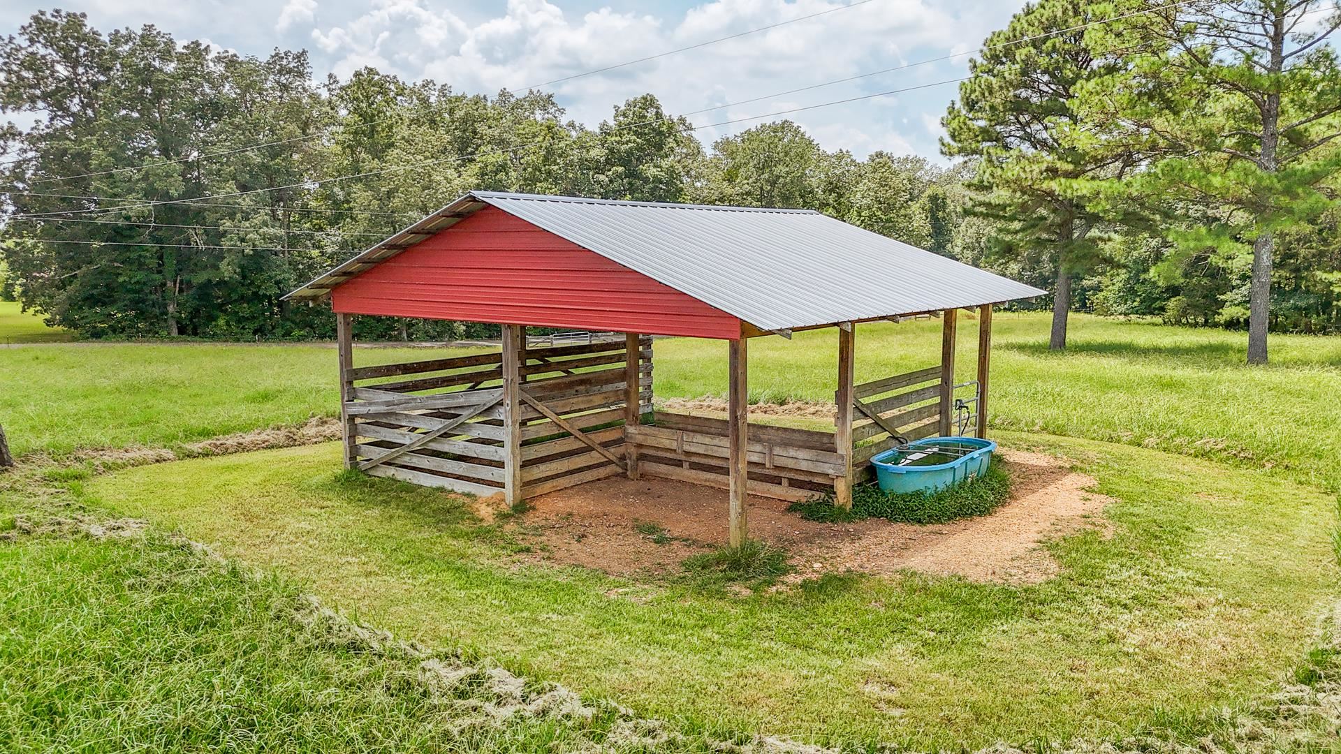 2690 Fellowship Road Sardis, TN 38371 - Photo 39 of 40 a view of a house with a backyard