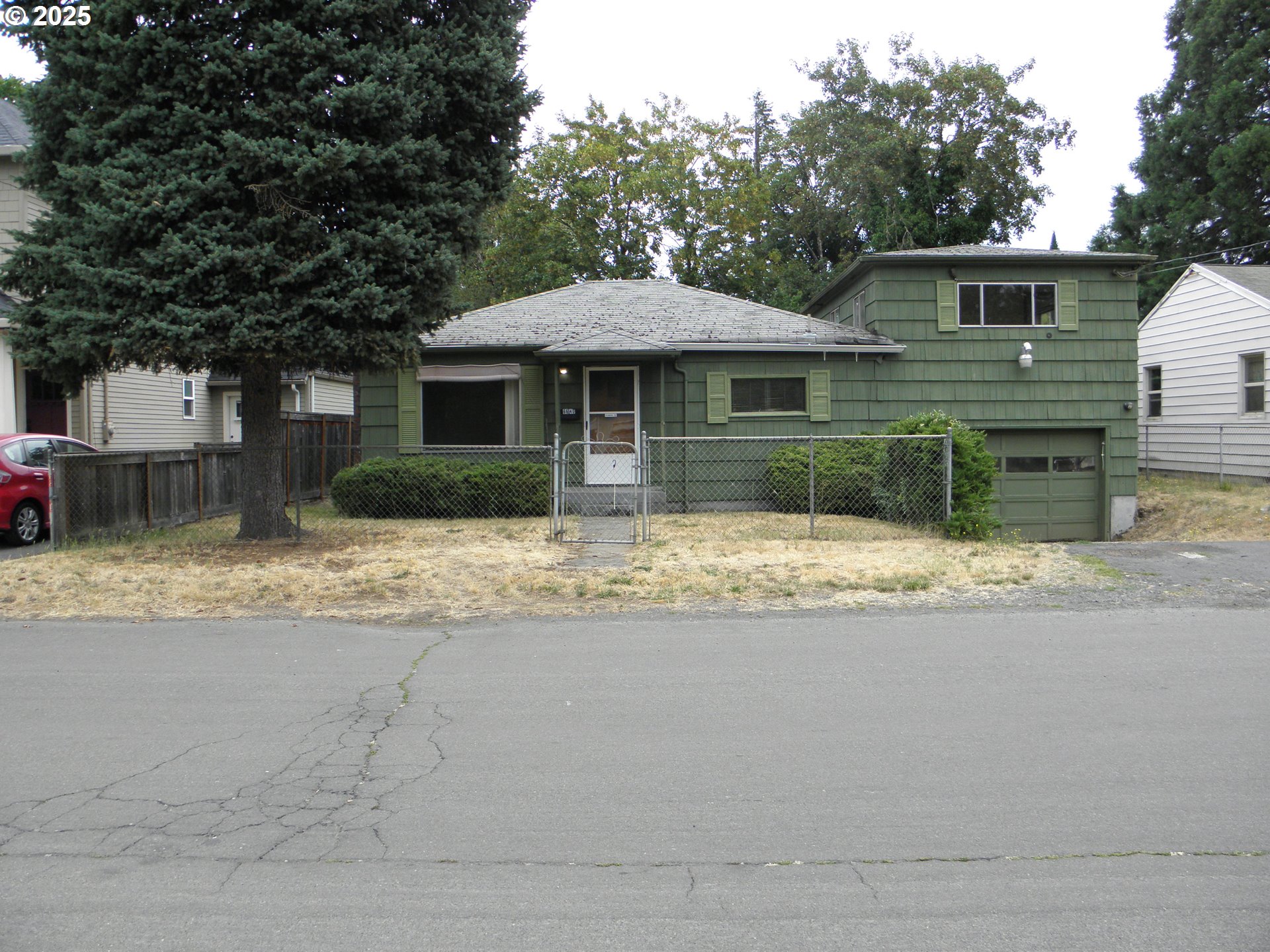 6640 Southeast 66th Avenue Portland, OR 97206 - Photo 1 of 21 a house view with a outdoor space