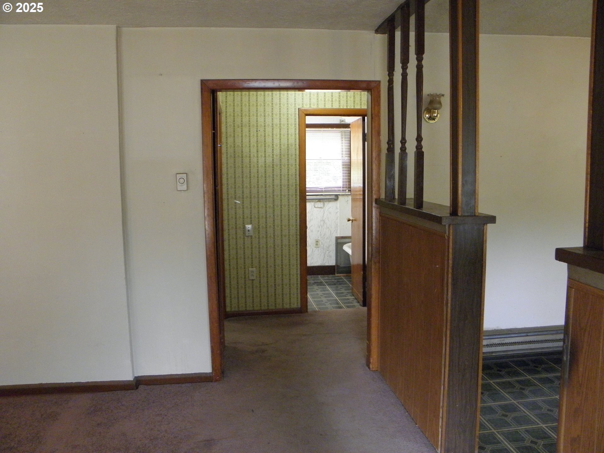 6640 Southeast 66th Avenue Portland, OR 97206 - Photo 2 of 21 a view of hallway with closet and a window