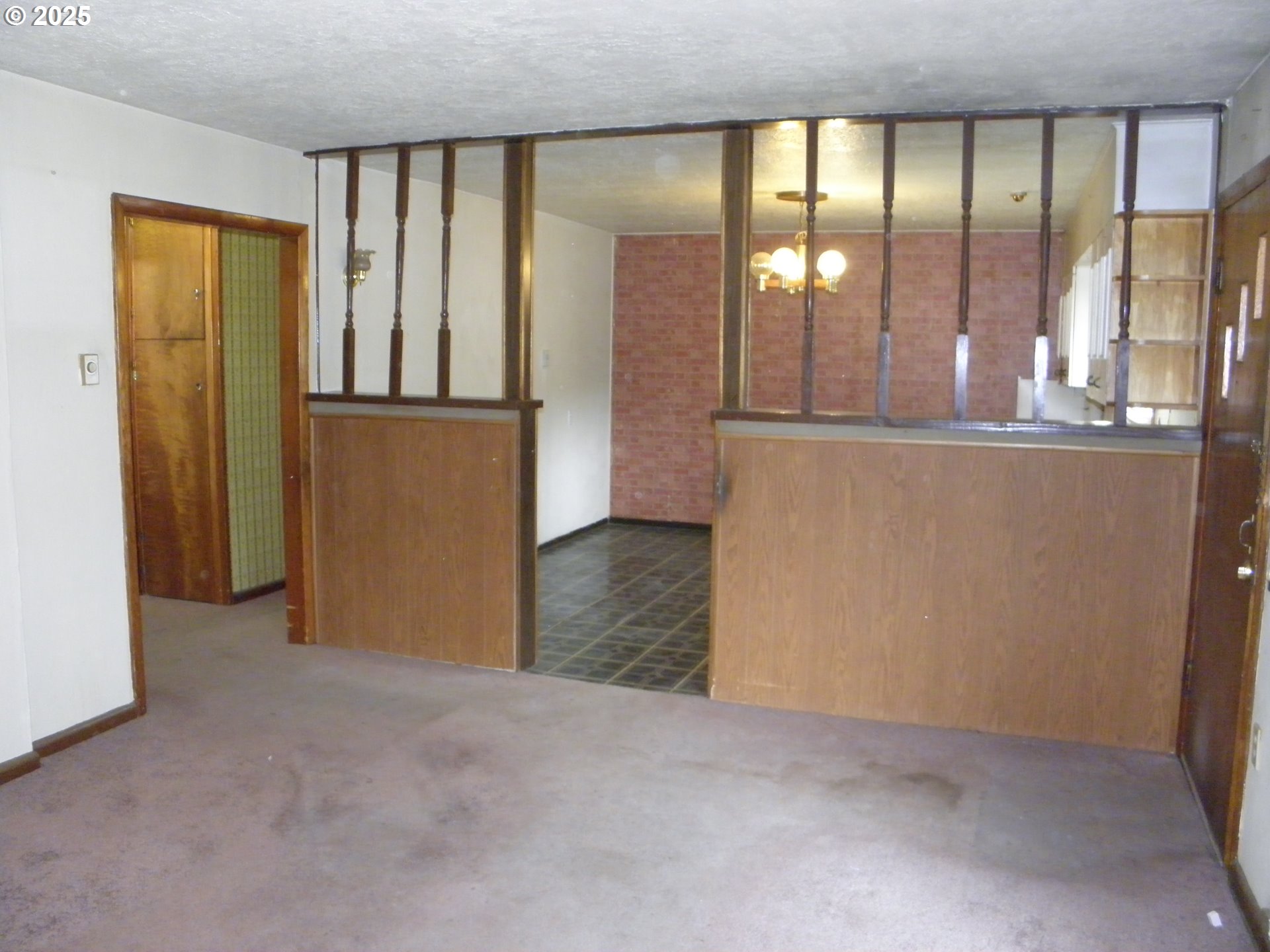 6640 Southeast 66th Avenue Portland, OR 97206 - Photo 5 of 21 wooden floor in an empty room with a window