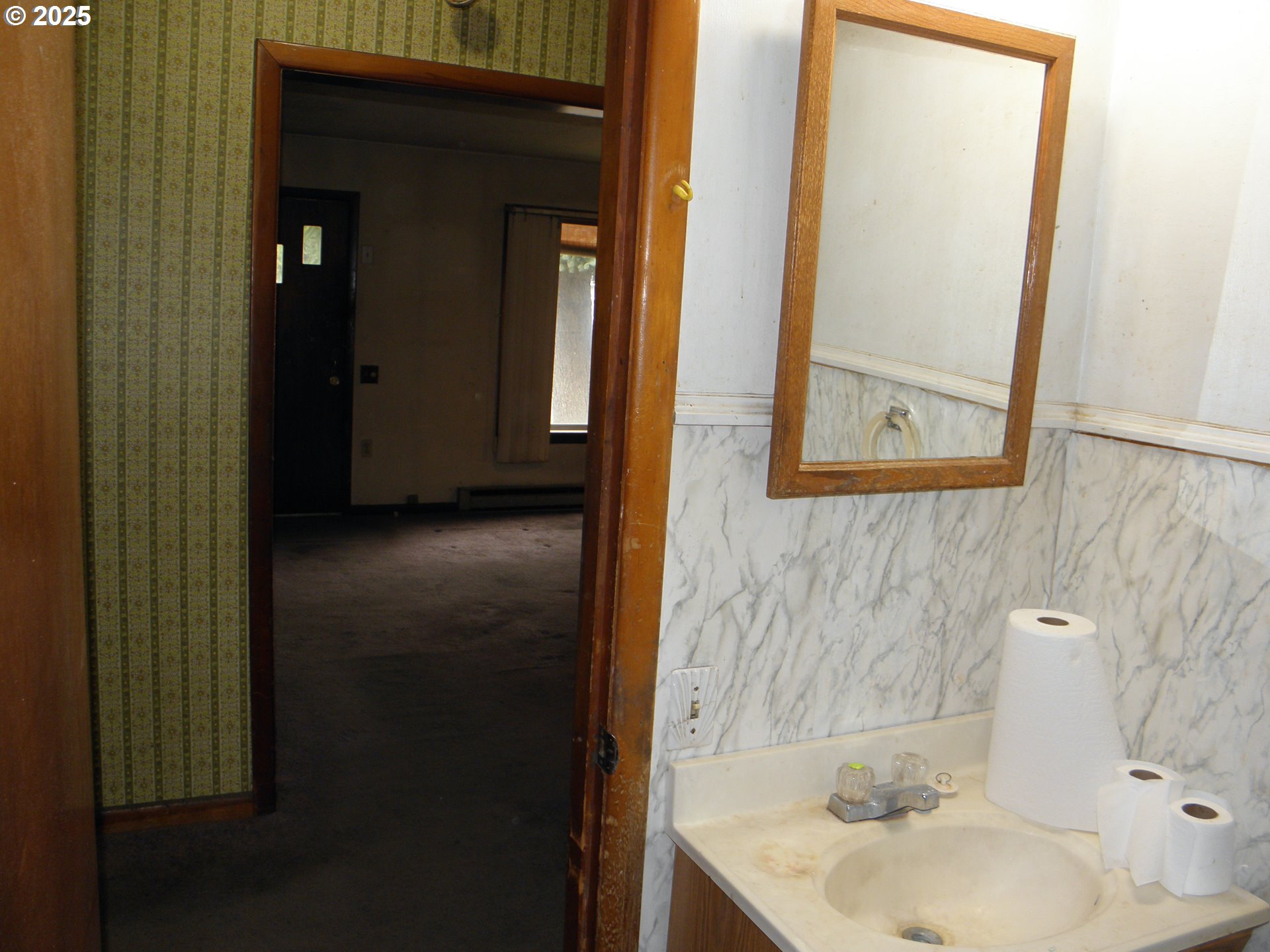 6640 Southeast 66th Avenue Portland, OR 97206 - Photo 8 of 21 a bathroom with a sink and a mirror