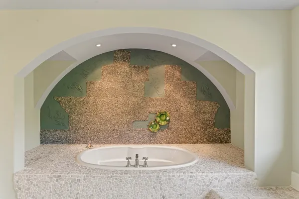 a bathroom with a sink vanity and a mirror