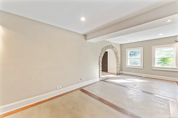 a view of a hallway view with staircase