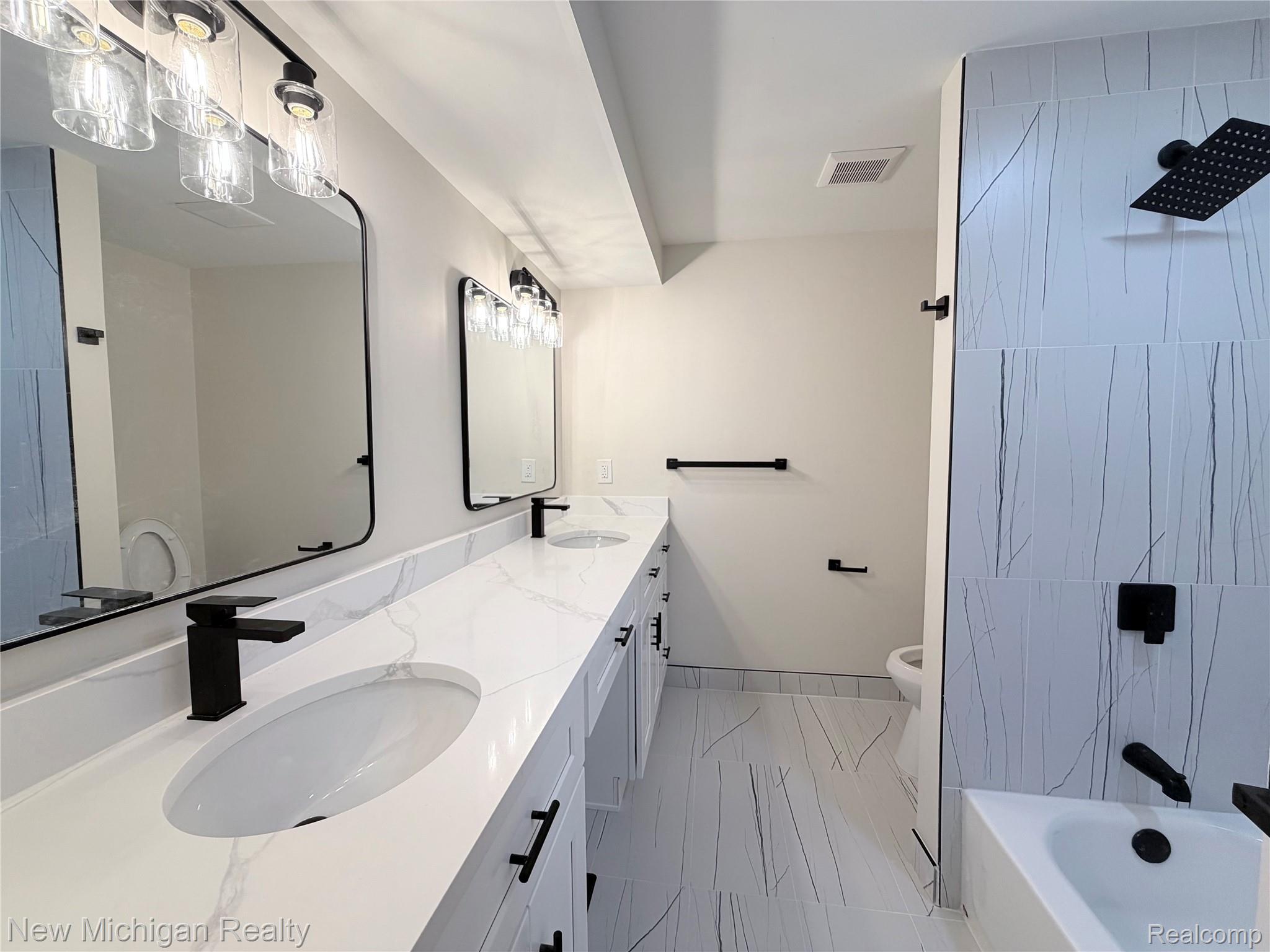 650 Deerfield Court Rochester, MI 48309 - Photo 32 of 37 Modern Bathroom Dual vanity, undermount sinks and quartz countertops