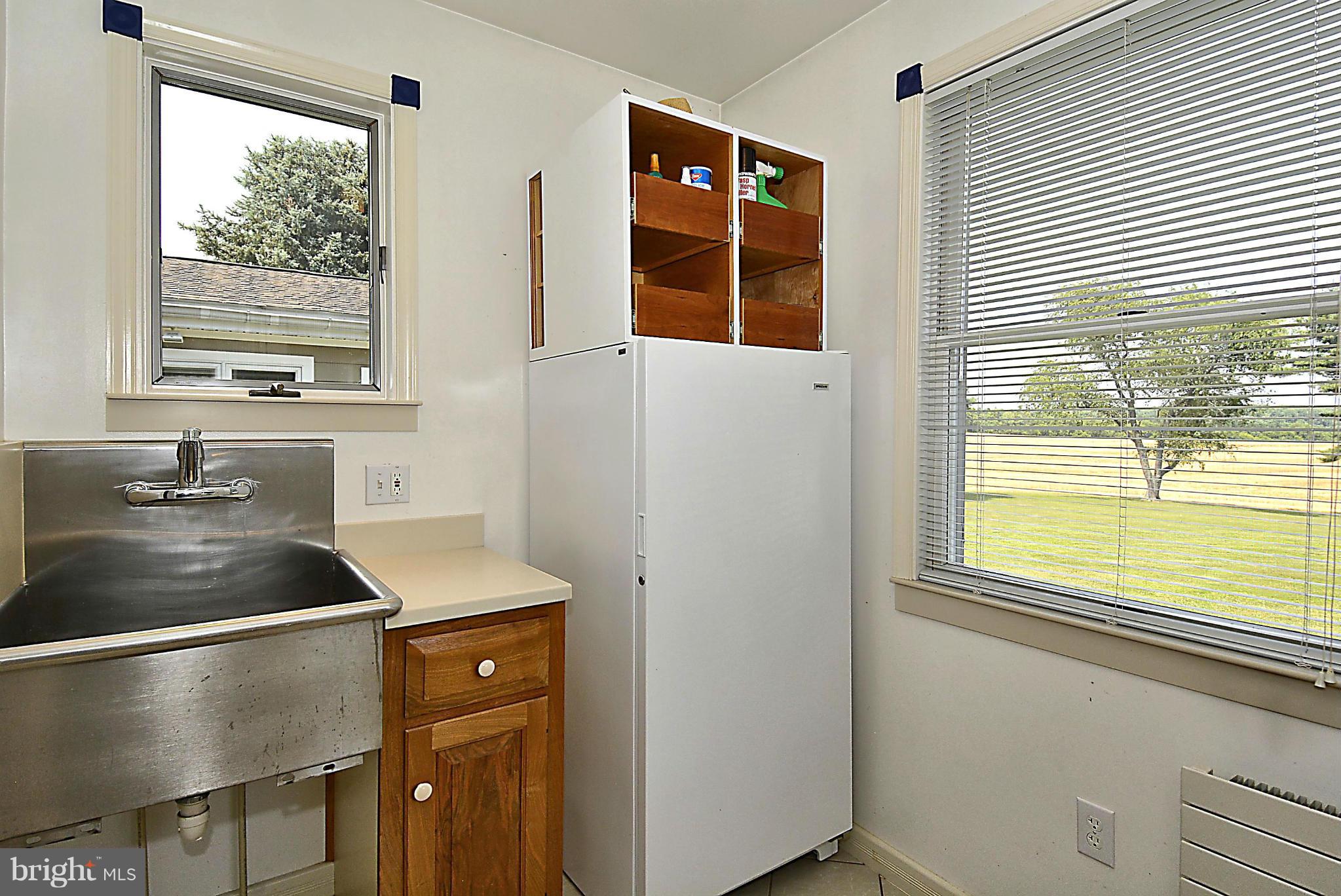 21121 Peach Tree Road Dickerson, MD 20842 - Photo 12 of 30 a kitchen with a sink and a window