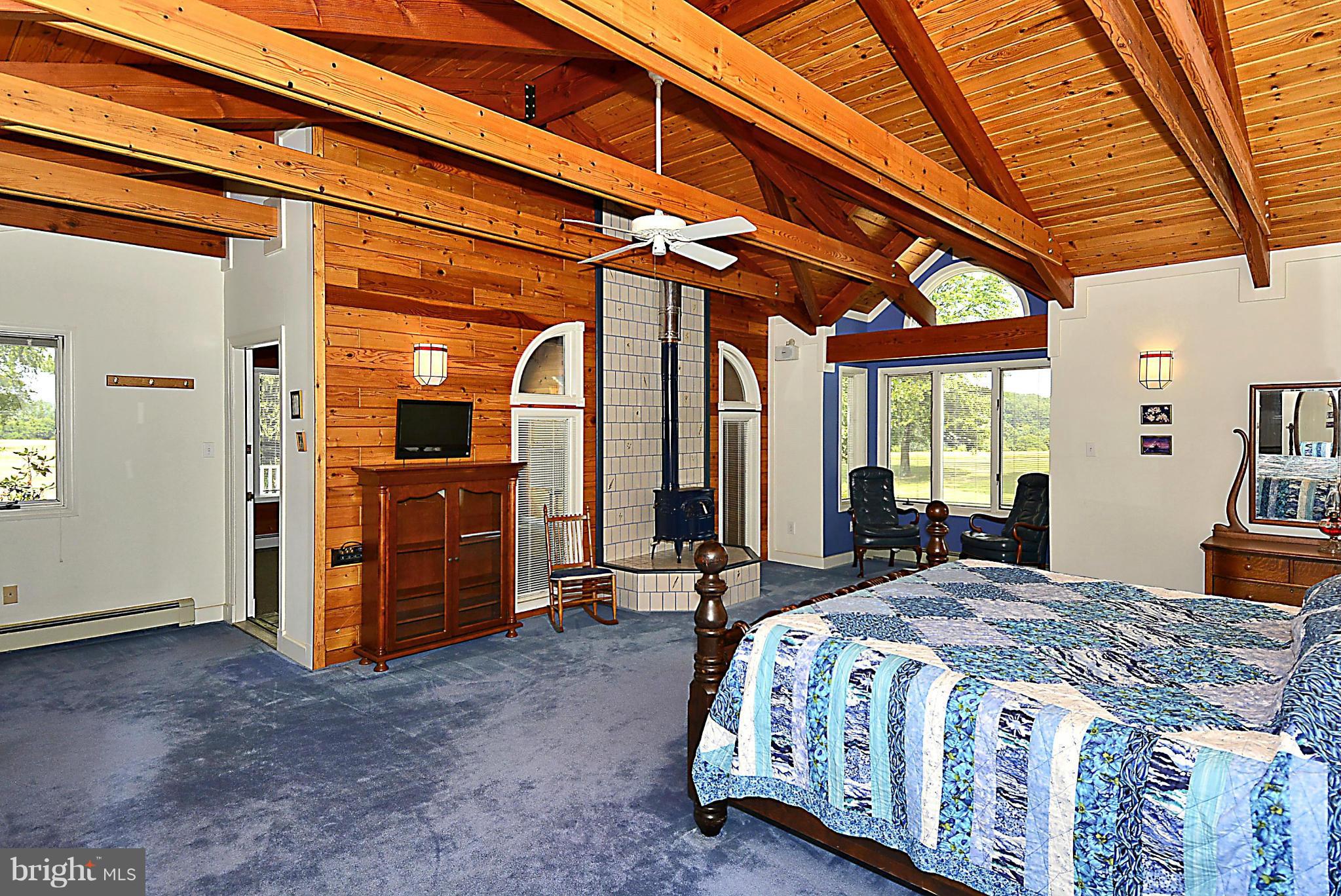 21121 Peach Tree Road Dickerson, MD 20842 - Photo 20 of 30 a large bedroom with a large bed and furniture