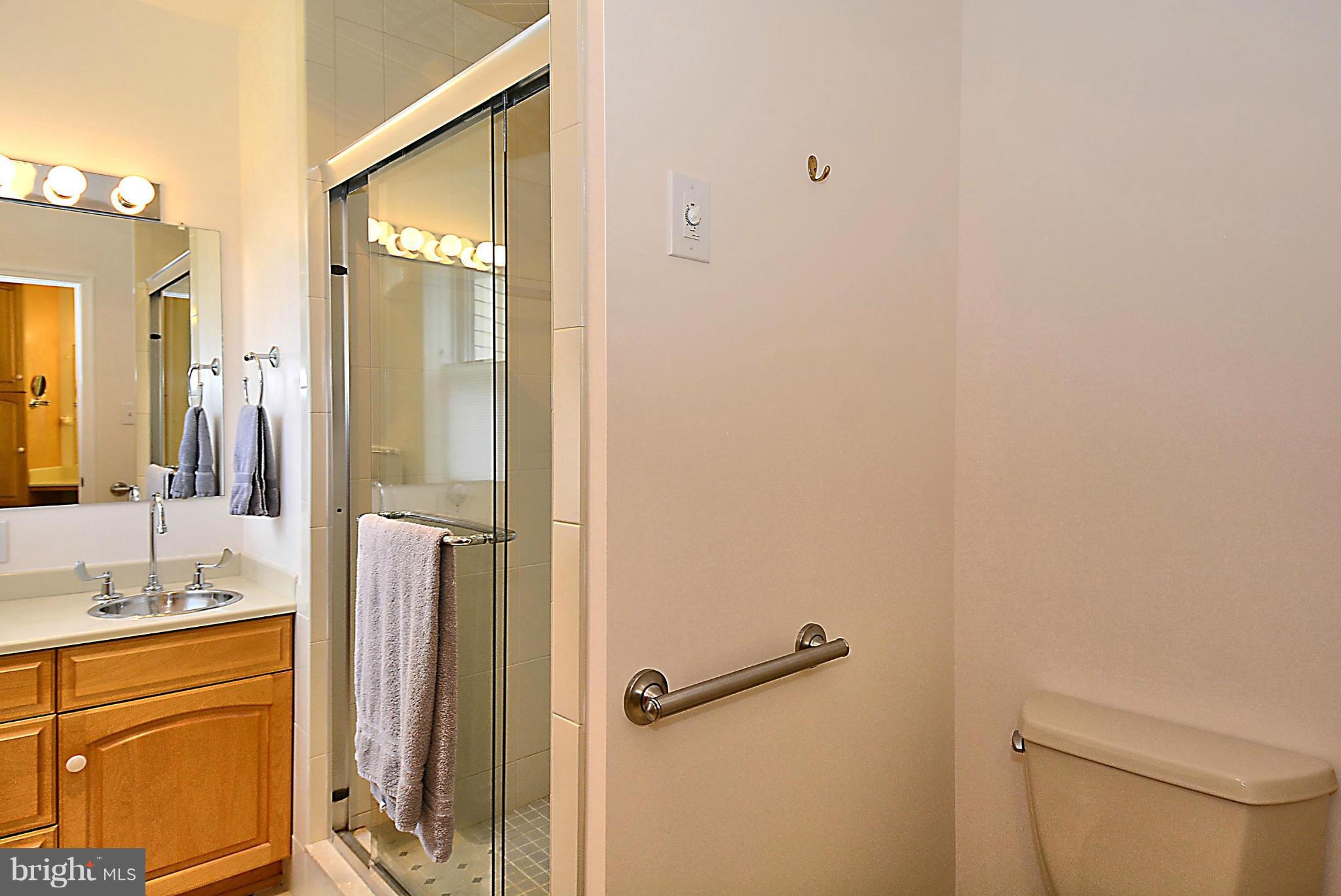 21121 Peach Tree Road Dickerson, MD 20842 - Photo 22 of 30 a bathroom with a granite countertop sink mirror and vanity