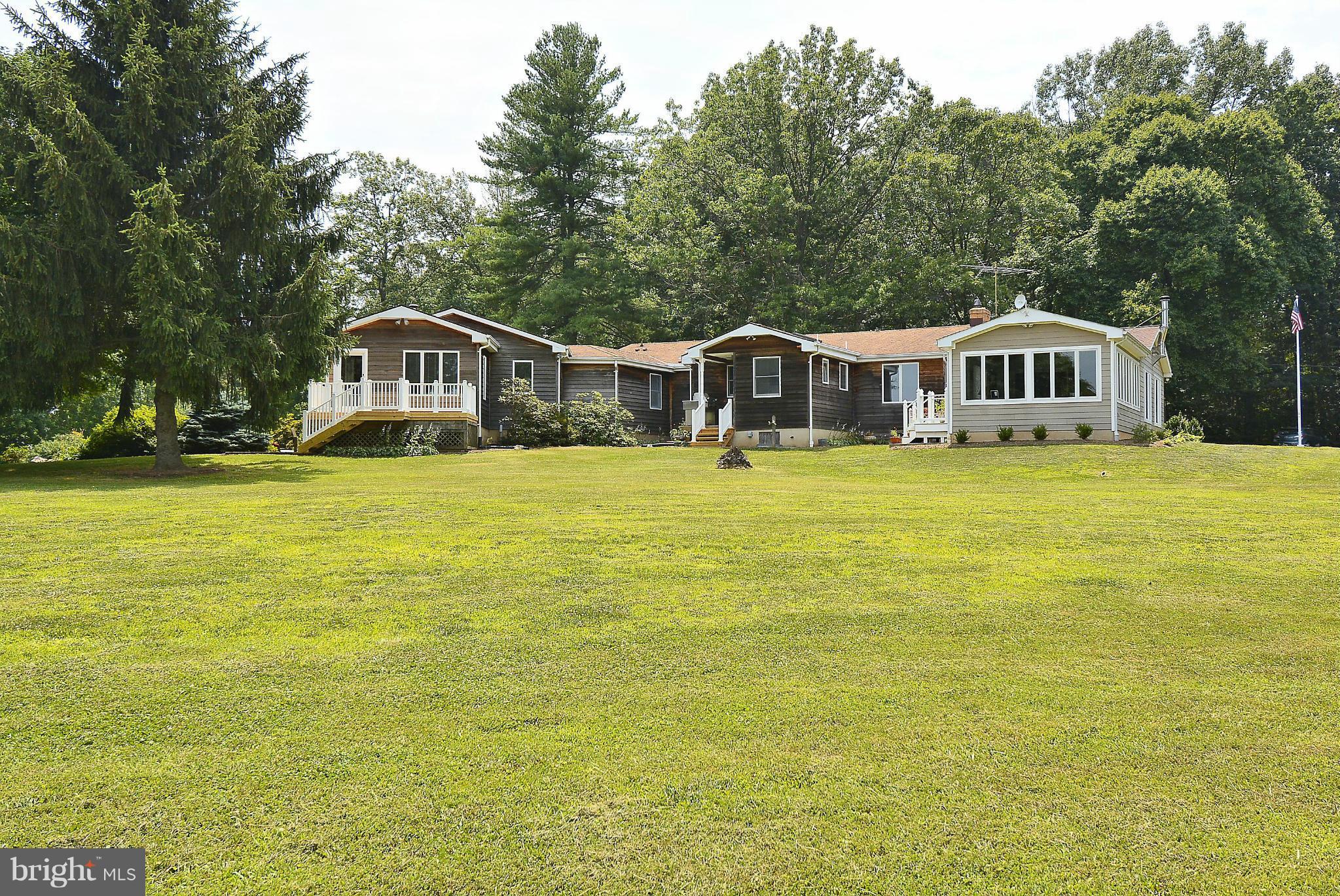 21121 Peach Tree Road Dickerson, MD 20842 - Photo 26 of 30 a front view of a house with a yard