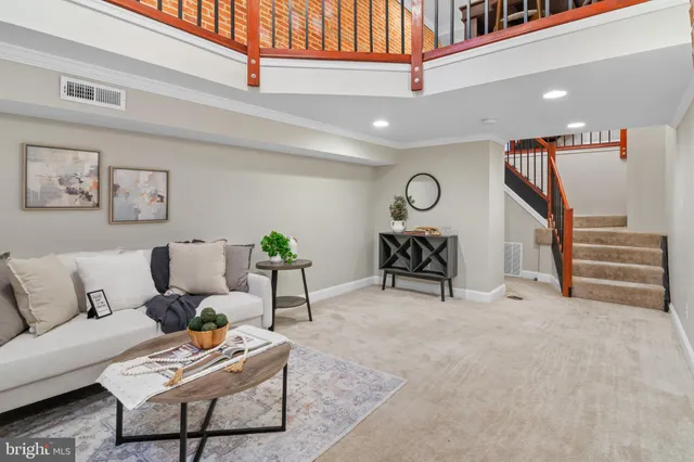 a bathroom with a tub a sink and a shower