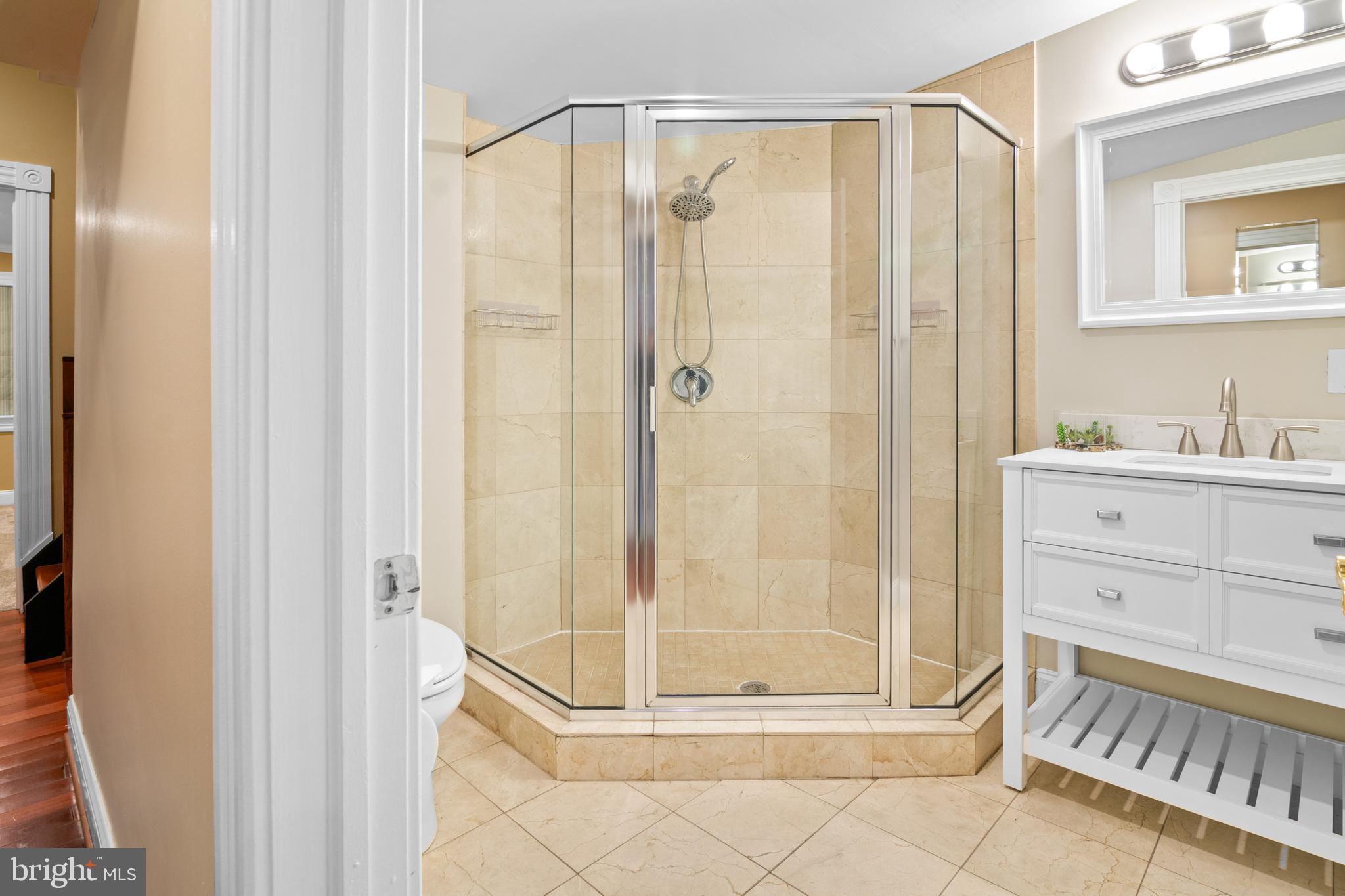 1535 South Hanover Street Baltimore, MD 21230 - Photo 28 of 43 a bathroom with a shower and a sink