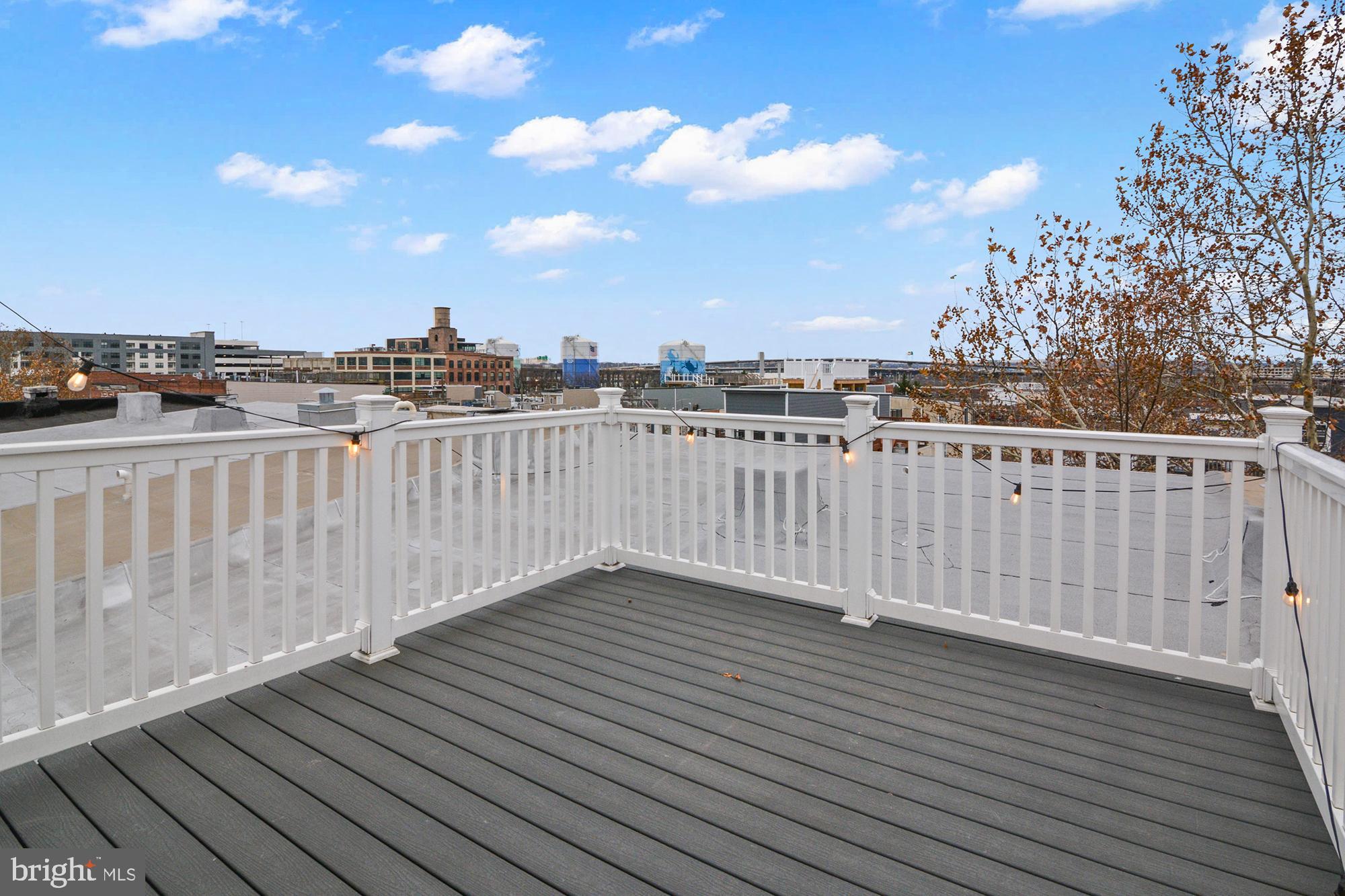 1535 South Hanover Street Baltimore, MD 21230 - Photo 32 of 43 a view of a balcony with wooden fence