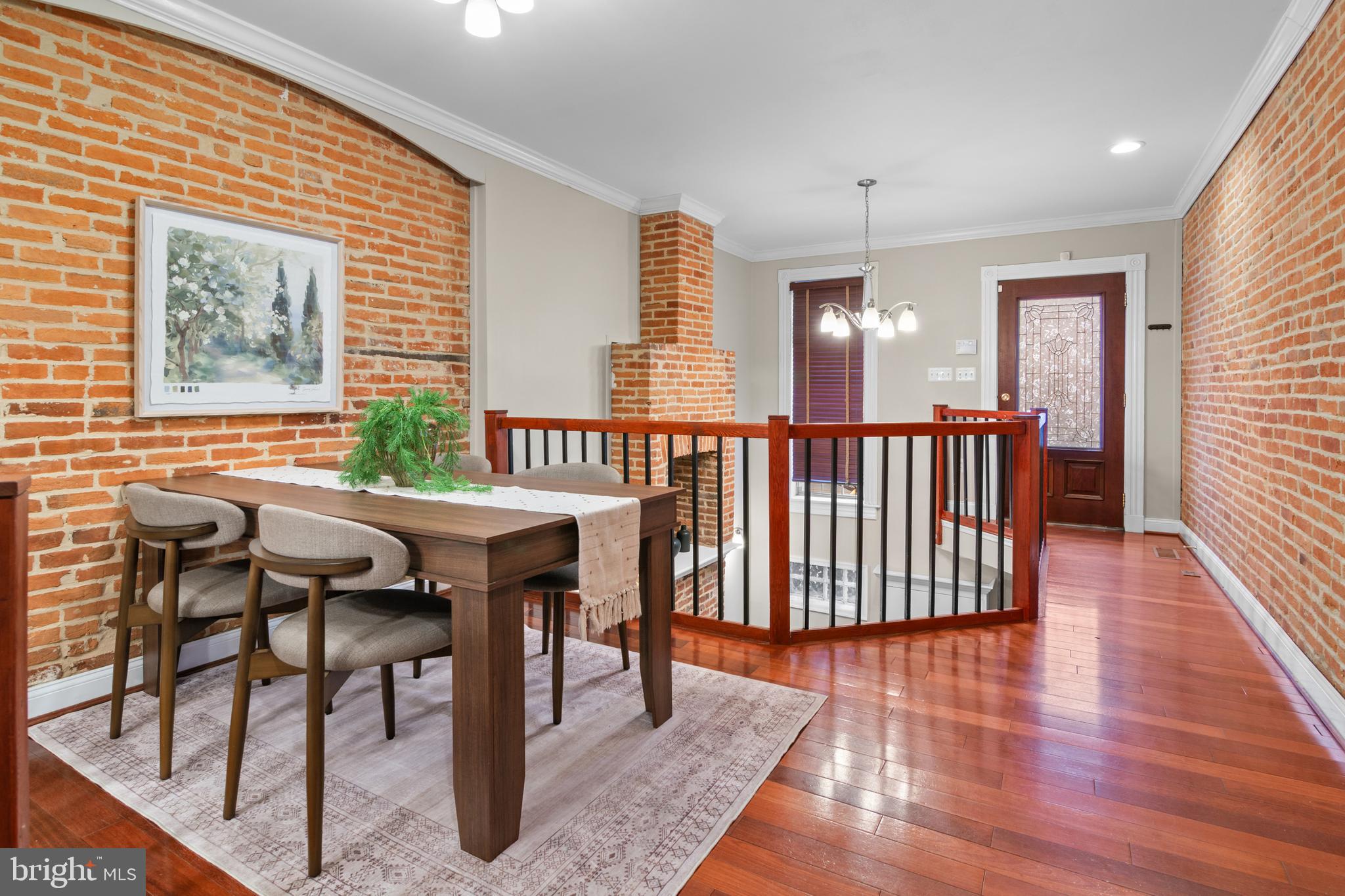 1535 South Hanover Street Baltimore, MD 21230 - Photo 6 of 43 a view of a dining room with furniture and wooden floor
