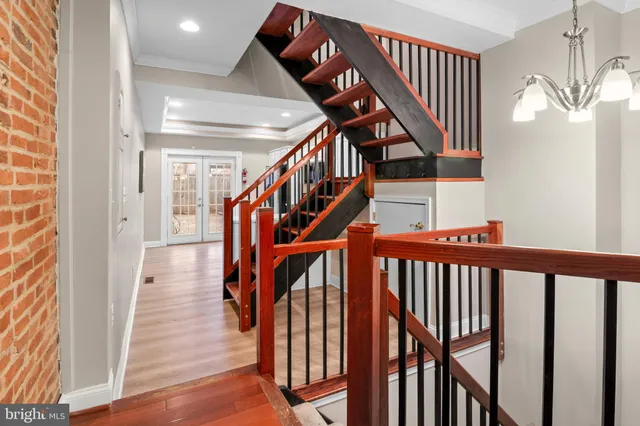 a kitchen with stainless steel appliances granite countertop a stove top oven and sink