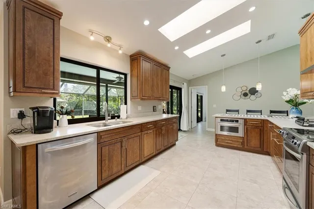 a kitchen with a table and chairs in it