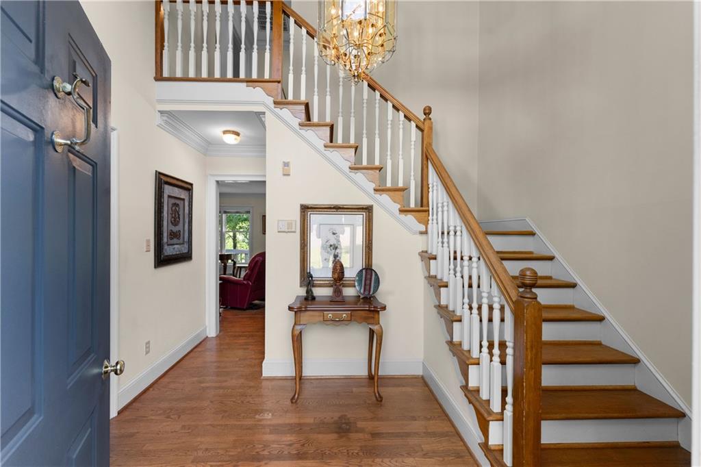 24 Commerce Row Northeast Cartersville, GA 30121 - Photo 6 of 37 a view of entryway and hall with wooden floor
