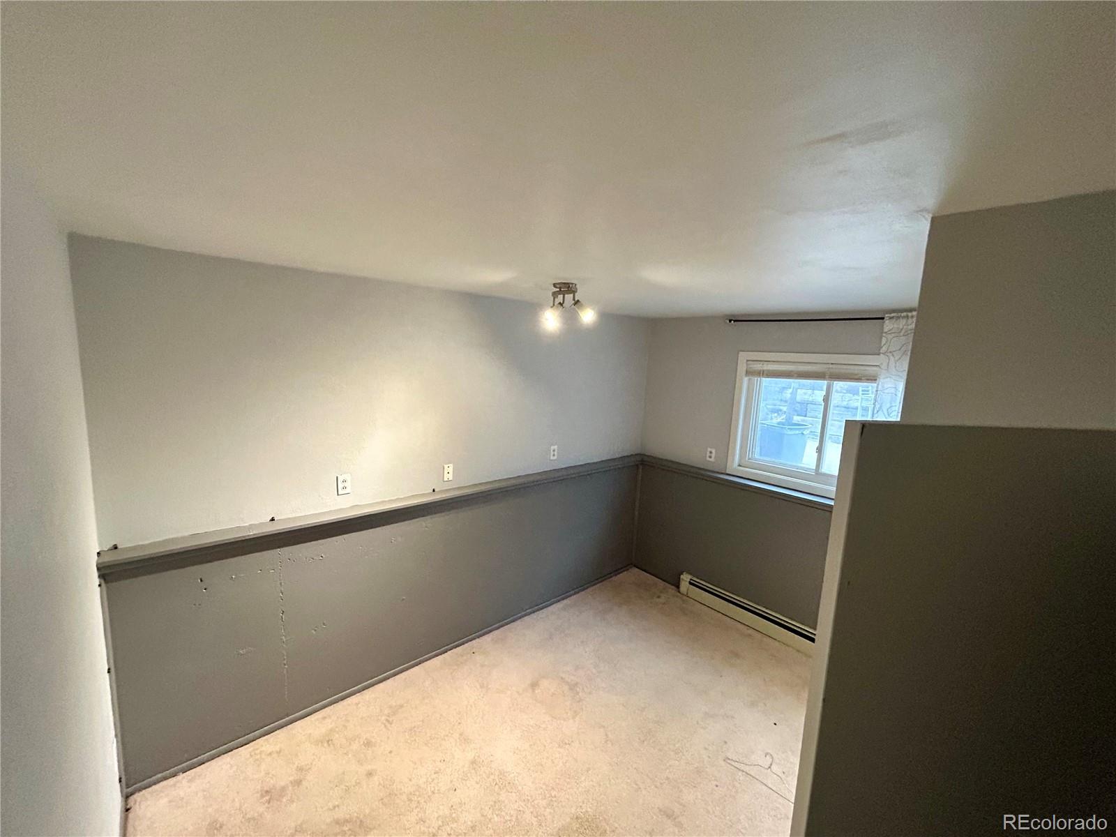 730 Ashley Road Craig, CO 81625 - Photo 15 of 43 a view of an empty room and window