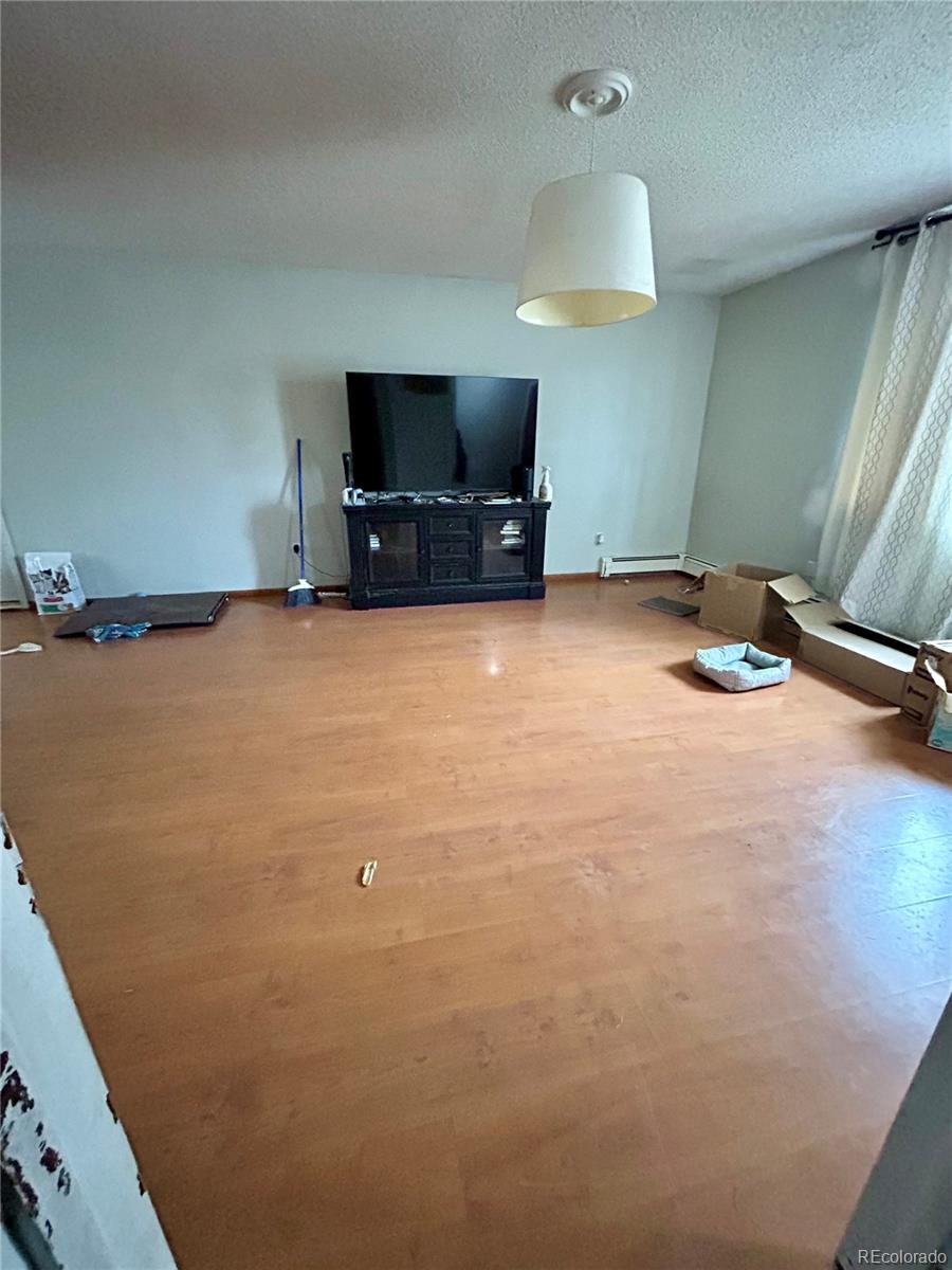 730 Ashley Road Craig, CO 81625 - Photo 21 of 43 a room with a flat screen tv and a lamp