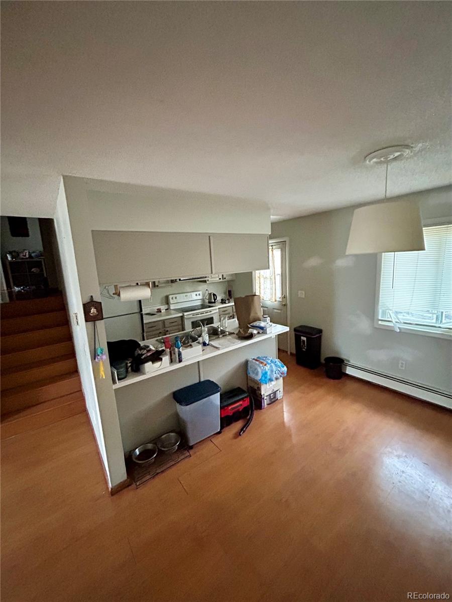 730 Ashley Road Craig, CO 81625 - Photo 22 of 43 a view of a room with gym equipment and a window