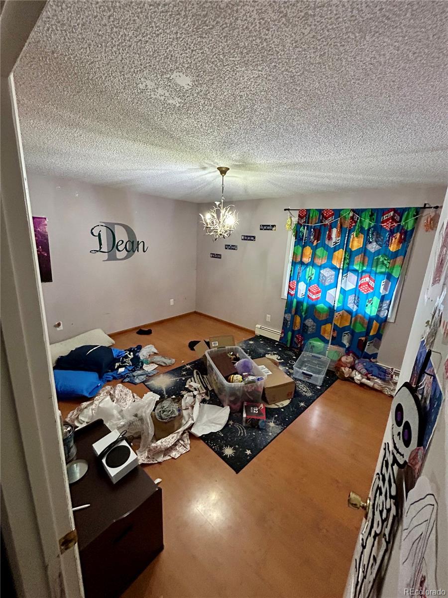 730 Ashley Road Craig, CO 81625 - Photo 25 of 43 a room with furniture and a flat screen tv