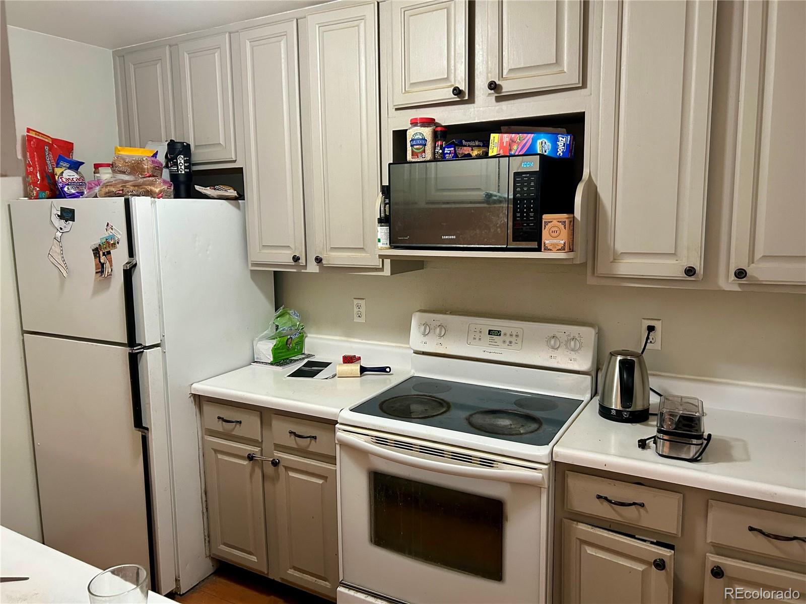 730 Ashley Road Craig, CO 81625 - Photo 6 of 43 a white refrigerator freezer sitting inside of a kitchen