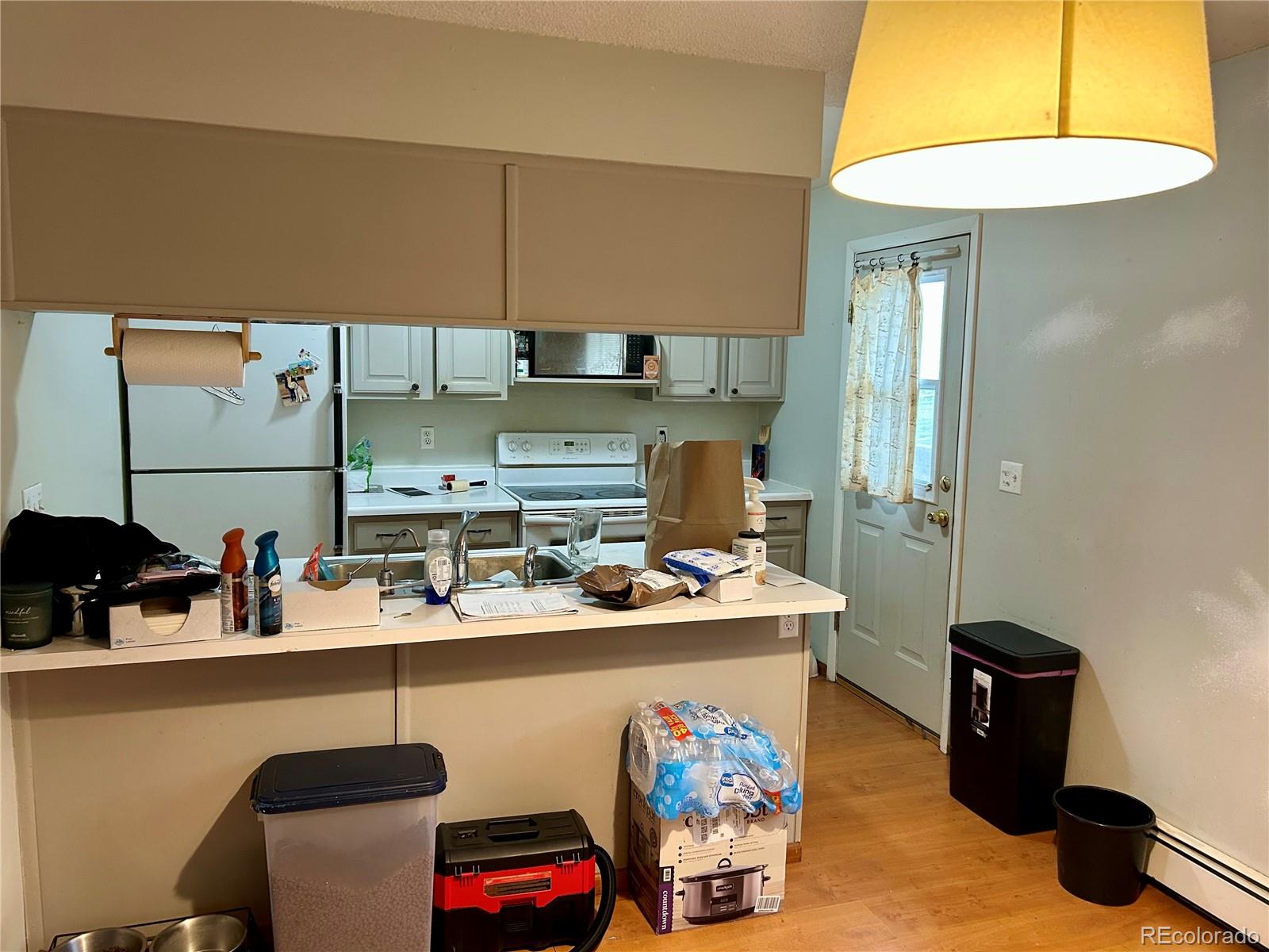 730 Ashley Road Craig, CO 81625 - Photo 8 of 43 a kitchen with a sink and a stove