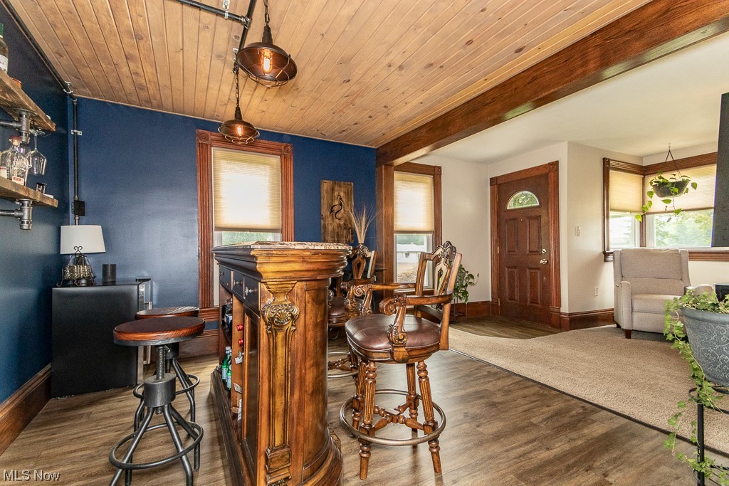 1540 Dock Road Madison, OH 44057 - Photo 10 of 34 Bar area with Luxury Vinyl Flooring
