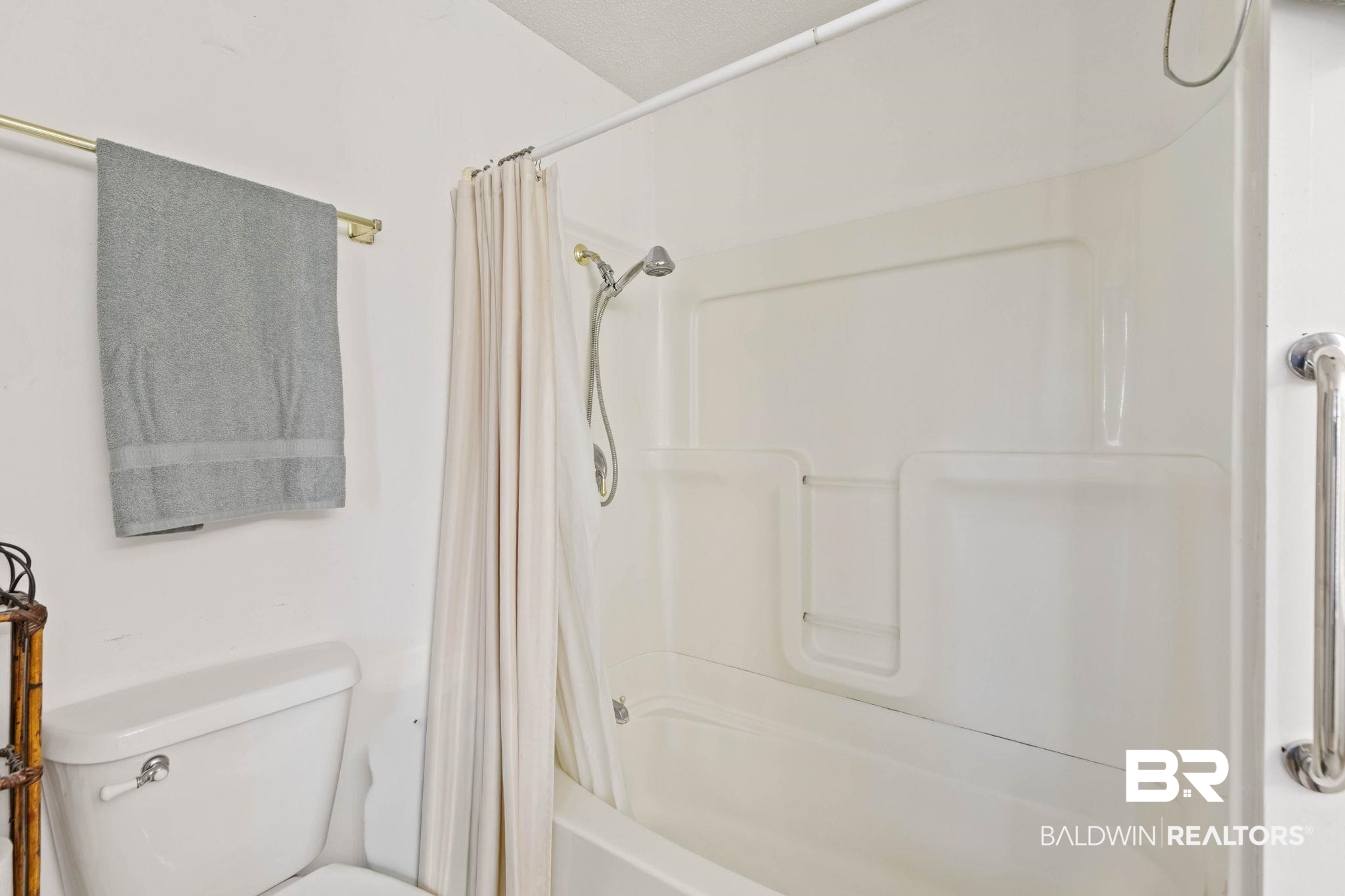 21267 Loop Road Andalusia, AL 36421 - Photo 35 of 72 Full bathroom featuring shower / tub combo and toilet