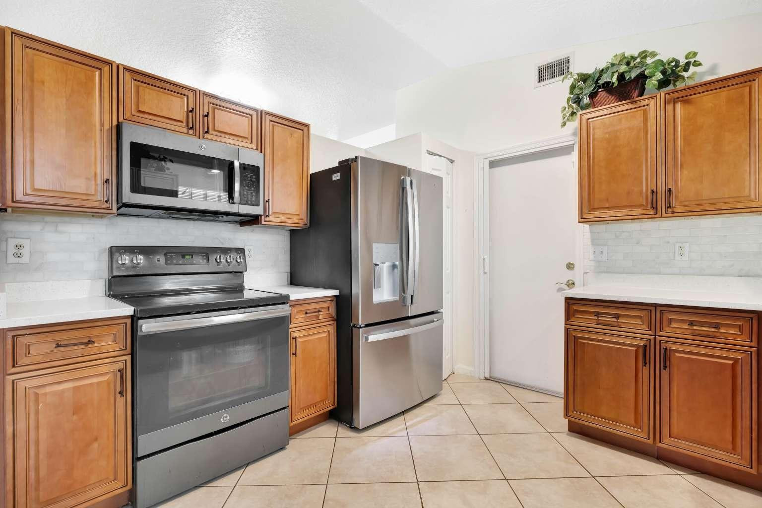 1002 Aspri Way Riviera Beach, FL 33418 - Photo 4 of 47 Photo 4