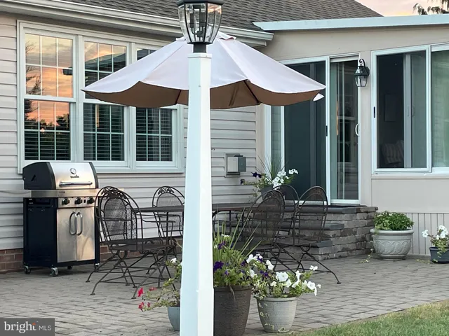 a front view of a house with patio