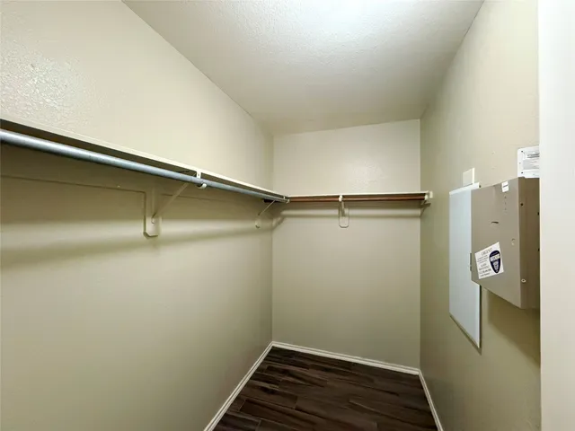 a bathroom with a shower and a toilet